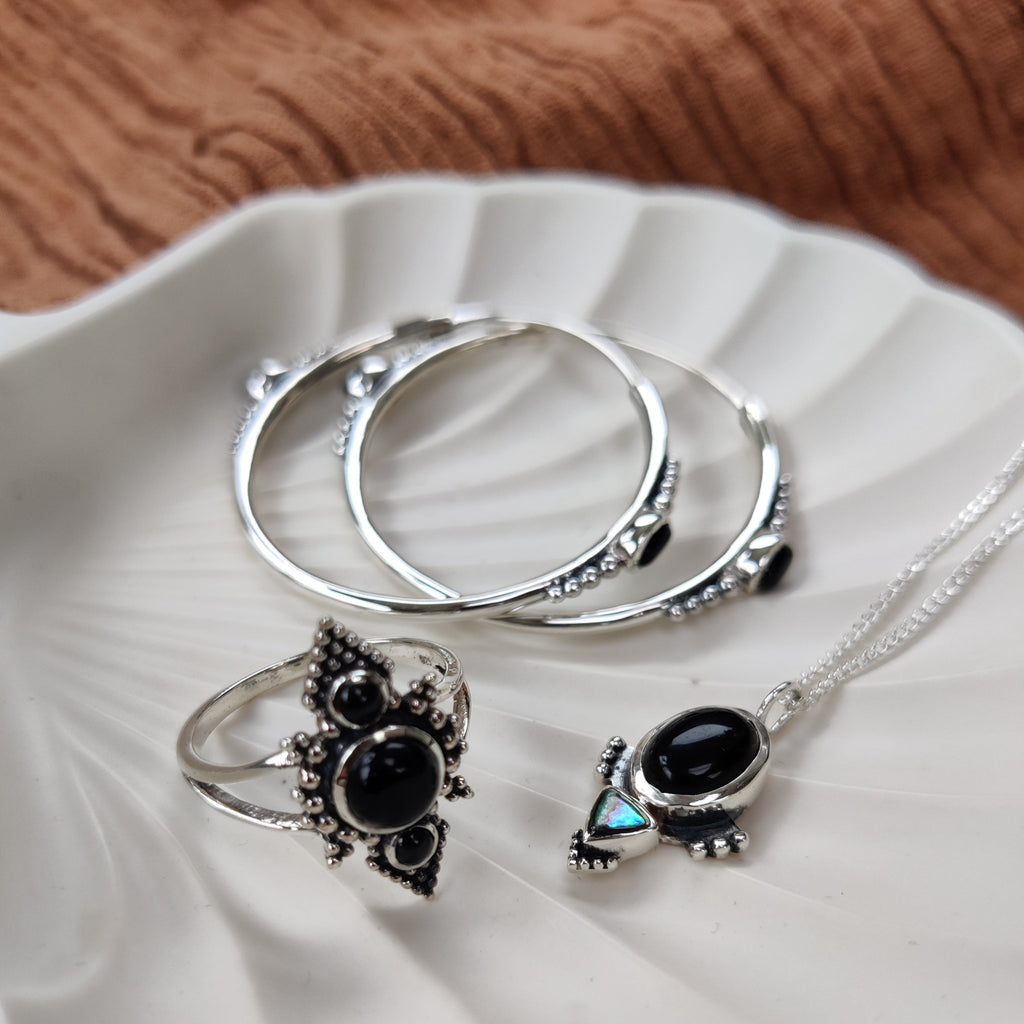 black onyx necklace, ring and hoop earrings made fromsterling silver 