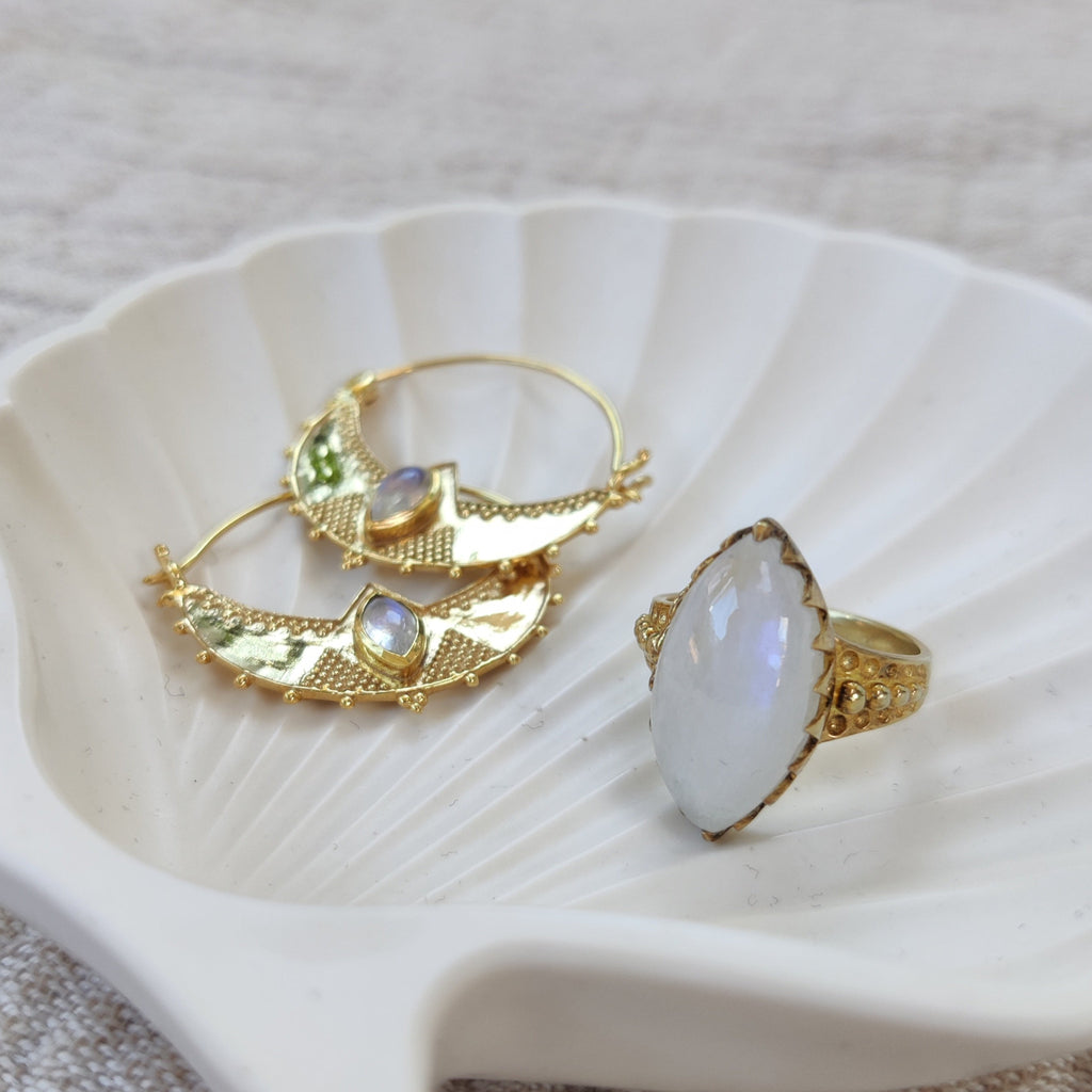 moonstone jewelry design by noomaad, crescent hoop earrings and empress ring
