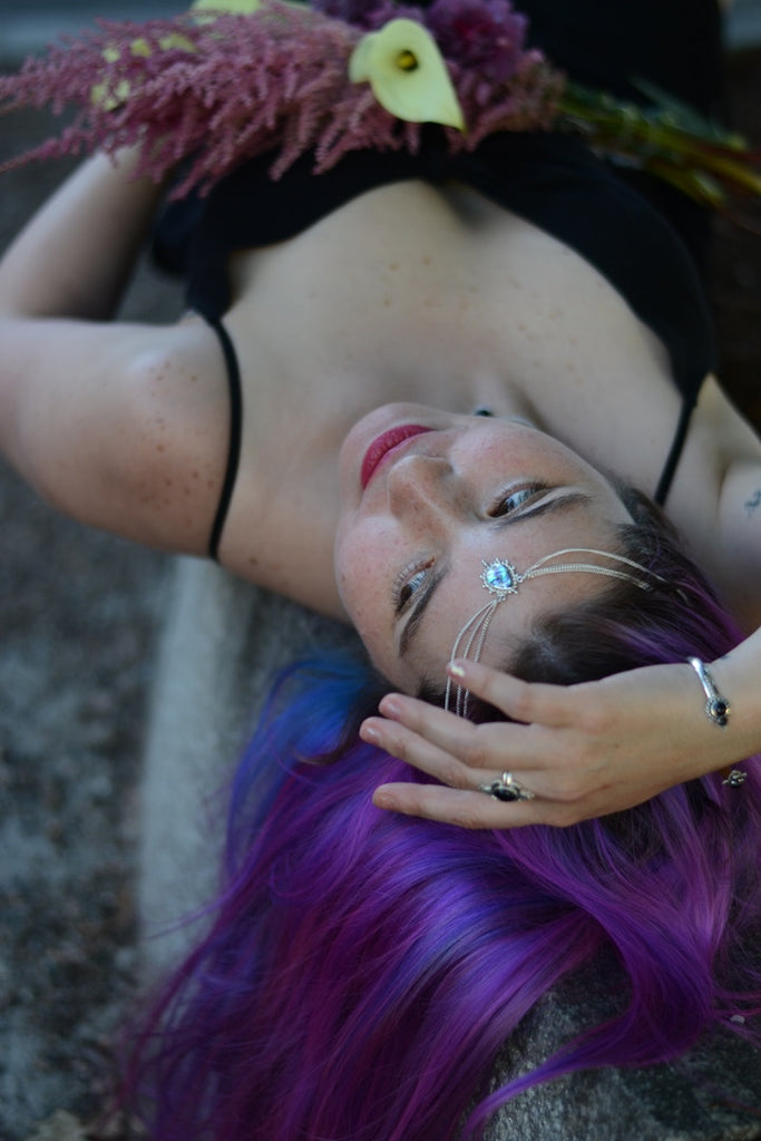 model wearing a head chain with abalone shell