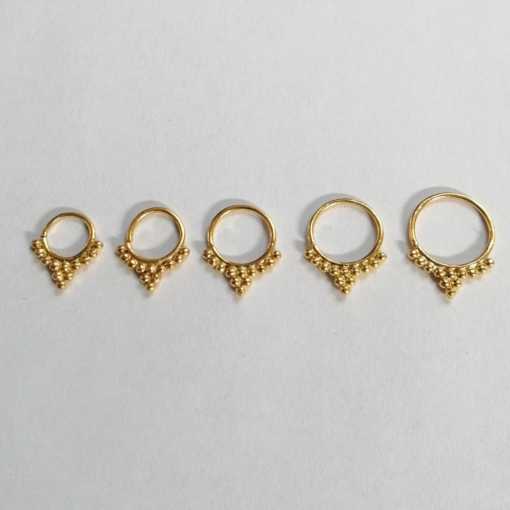 delicate gold piercing rings