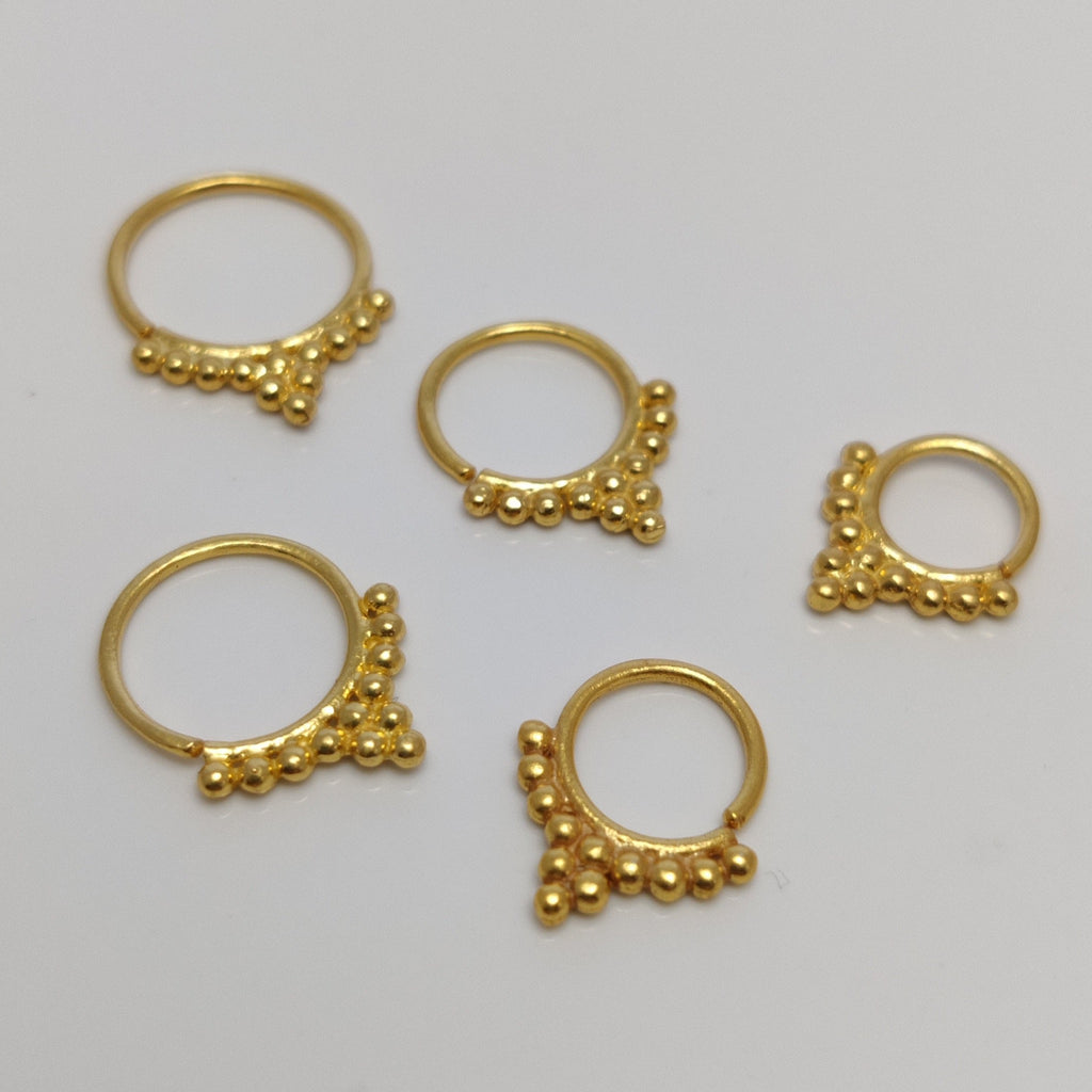 small gold piercing rings