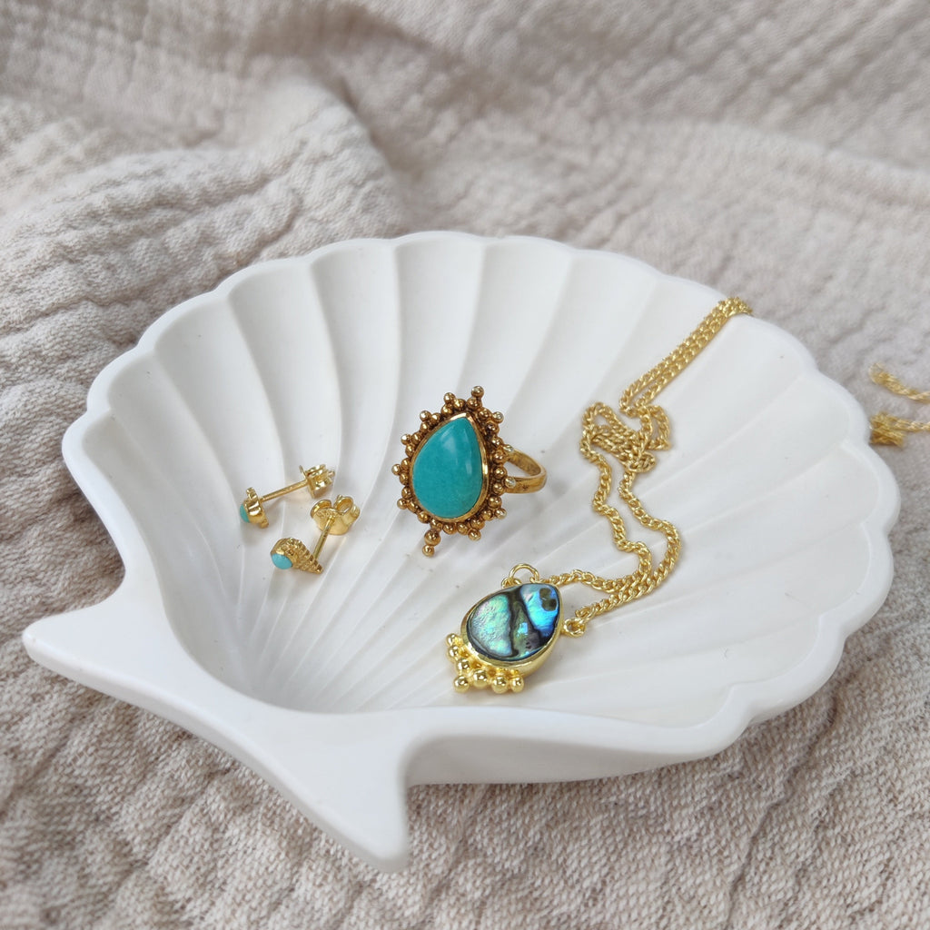 turquoise stud earrings, ring and drop-shaped abalone shell necklace
