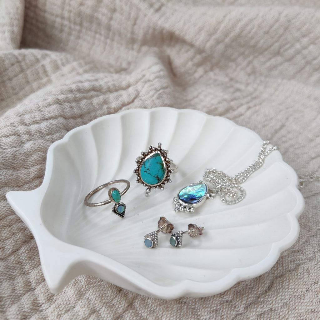 noomaad jewelry, turquoise rings, abalone shell drop necklace, tiny stud earrings crafted from sterling silver sterling silver