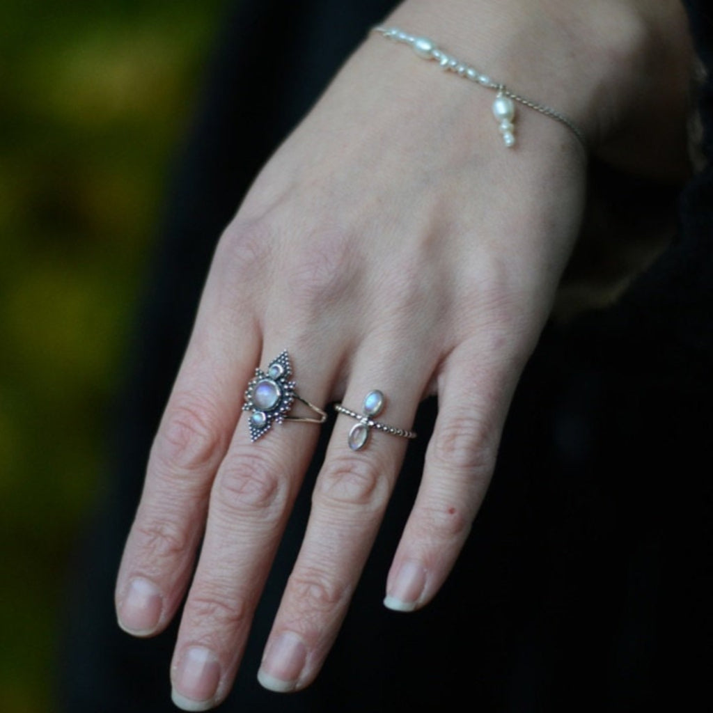 moonstone rings and pearl bracelet with charms, crafted from sterling silver