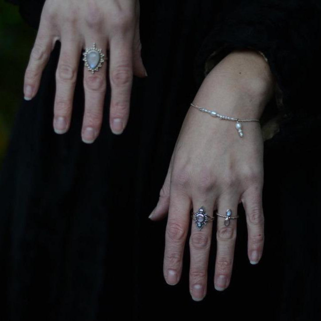 Pearl Bracelet with Sterling Silver Chain, styled with moonstone ring on model