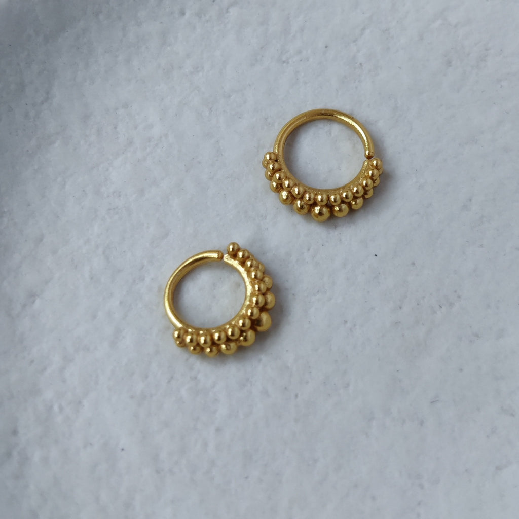 two septum nose rings, gold