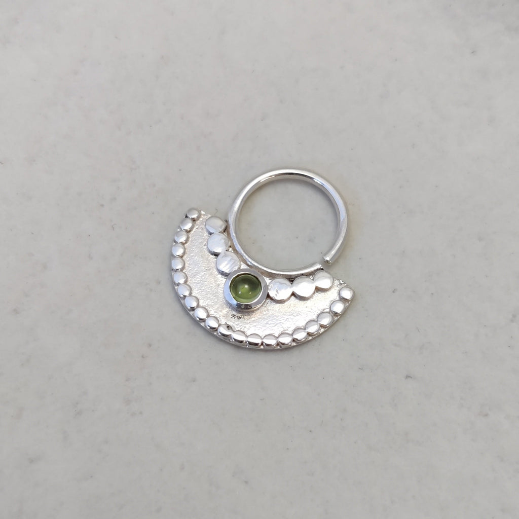 Large silver septum nose ring with peridot, diameter 10 mm. 