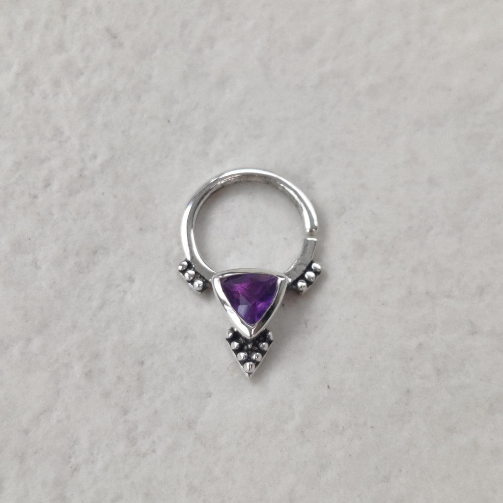 Silver septum nose ring with triangle shaped amethyst.