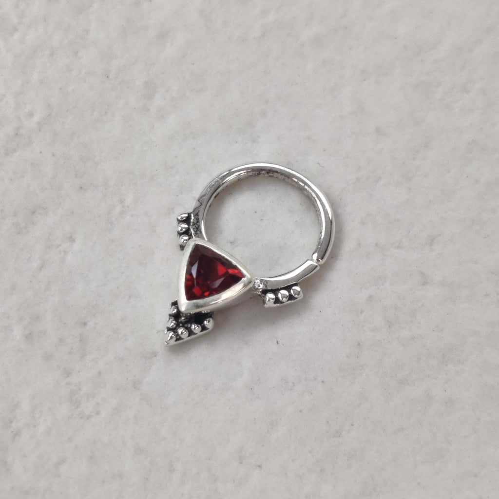Bohemian silver septum nose ring with a red gemstone