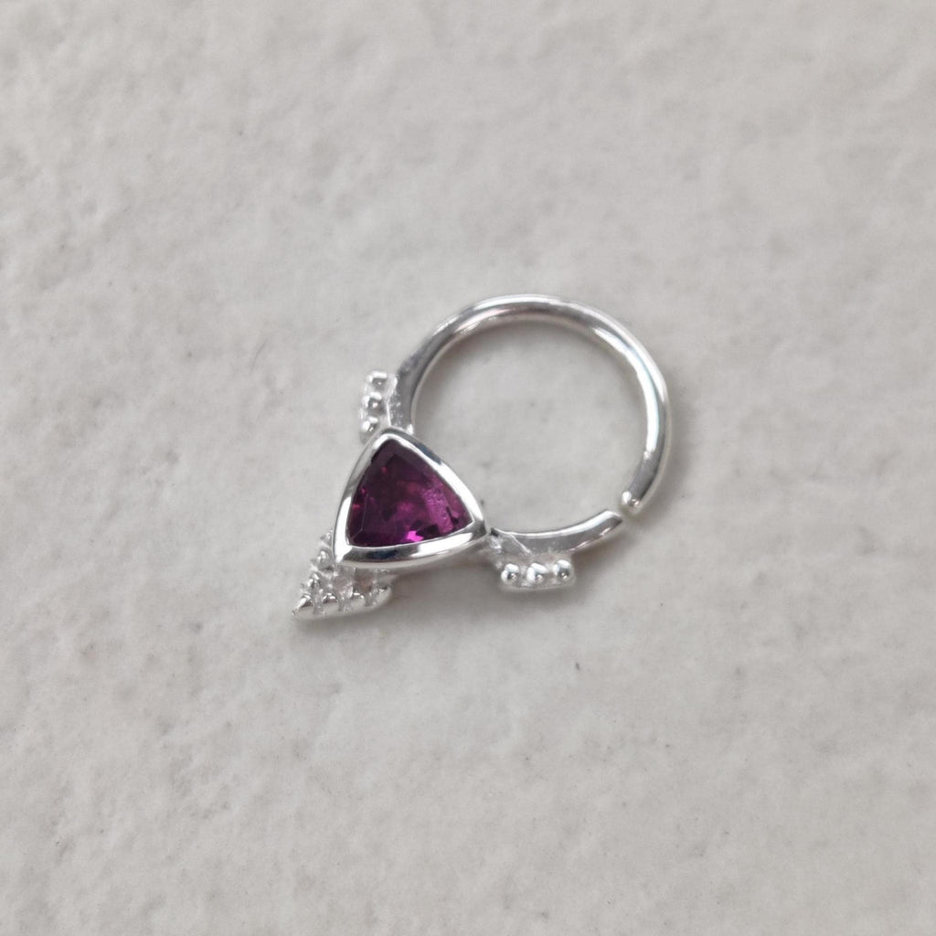 Silver septum nose ring with a triangle shaped rhodolite garnet