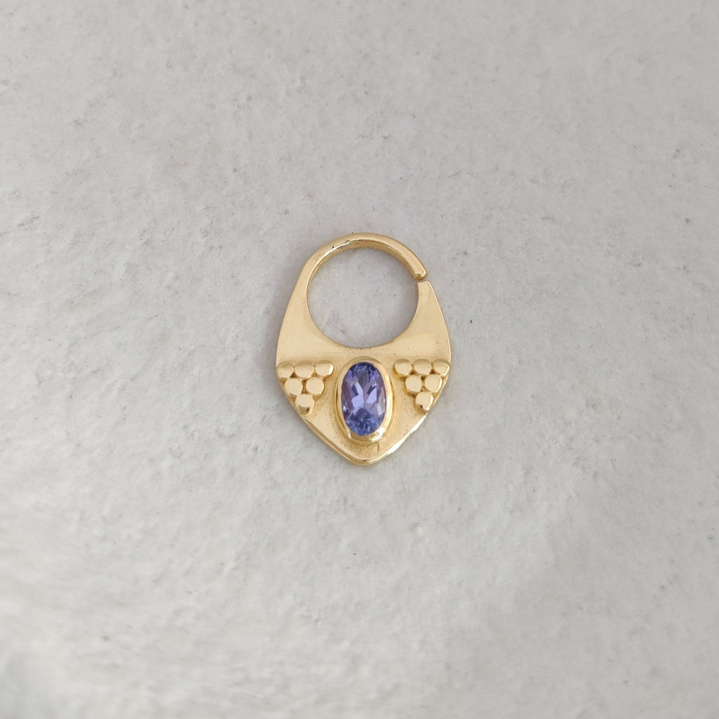 Triangle gold septum nose ring with blue purple gemstone