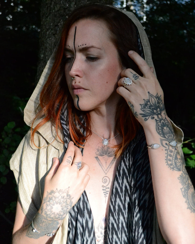 Beige hood scarf on model.