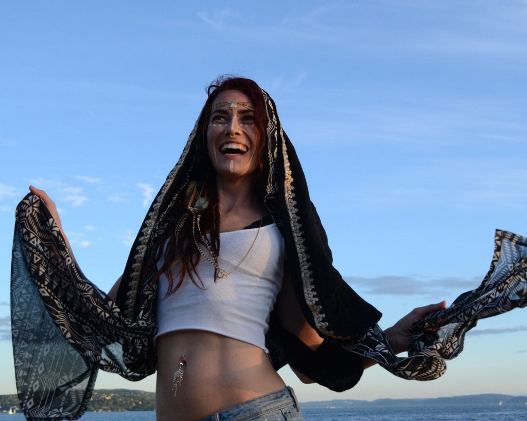 Tribal hood scarf on model.